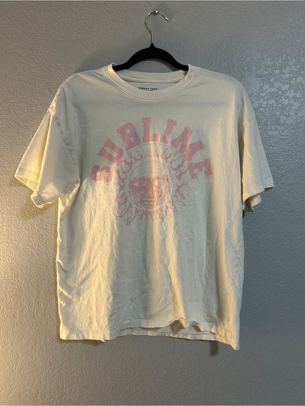 American Eagle Outfitters Cream Graphic Tee with Black Print